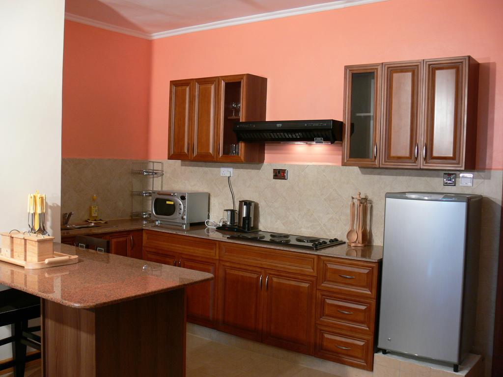 Natural Oak Apartments Nairobi Rum bild